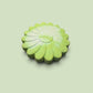 One (1) Thick Light Green and Blue Flower